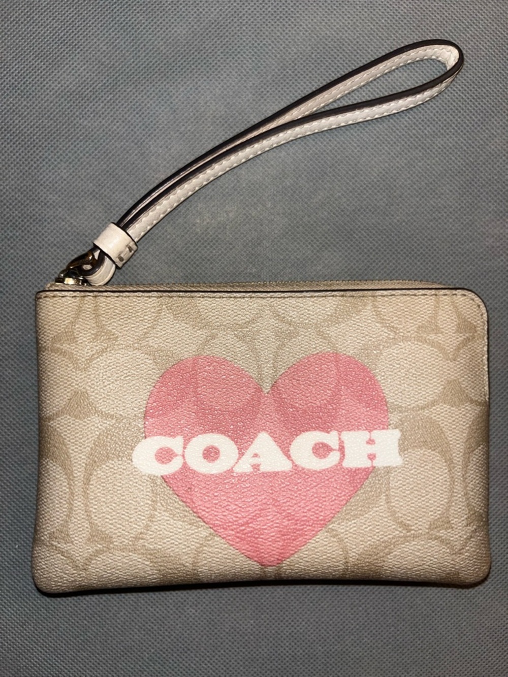 Coach Beige Wristlet with Pink Heart Logo